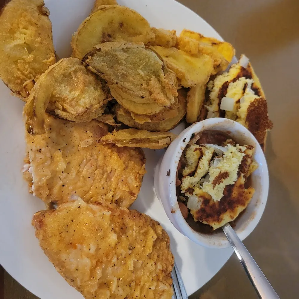 Pork Chops Squash Fried Green Tomatoes Pinto Beans and Corn Bread